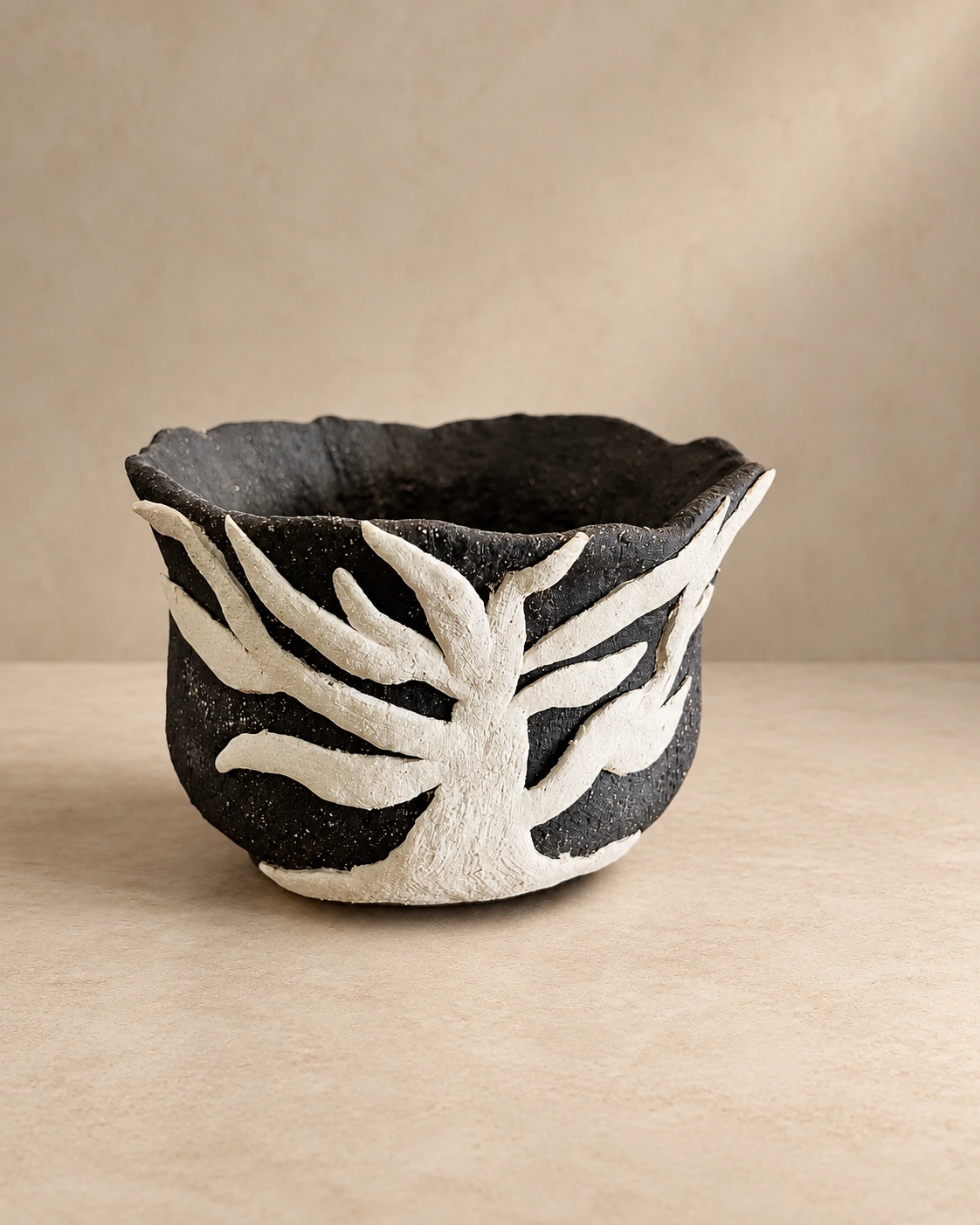 Ignis — black and white clay by Shristi Shrestha Demougeot